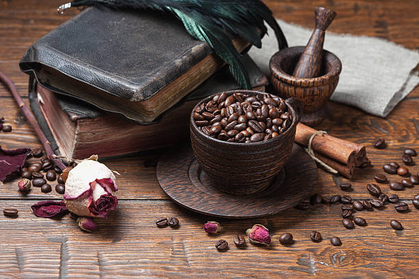 istock Cup of coffee, dry rose and grinder 610138090