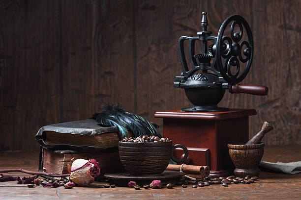 istock Cup of coffee, dry rose and grinder 610138256