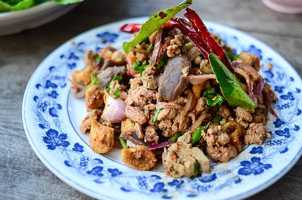 istock spicy minced pork salad, minced pork mash with spicy 610138856