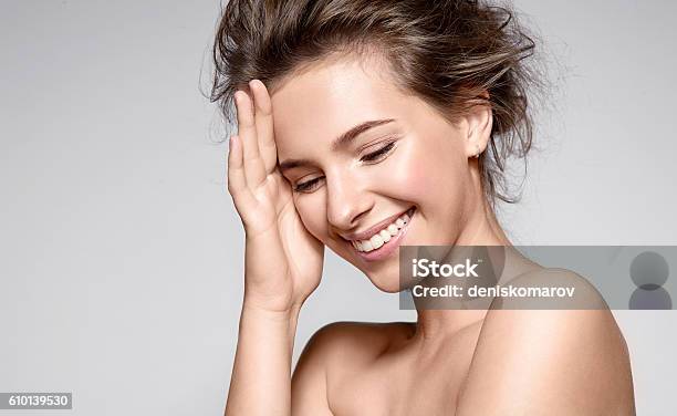 Beautiful Smiling Woman With Clean Skin And White Teeth Stock Photo - Download Image Now