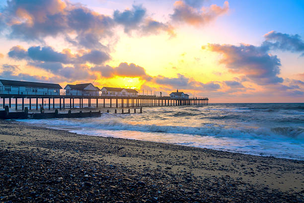 Sunrise at Southwold Pier Sunrise at Southwold Pier in UK southwold stock pictures, royalty-free photos & images