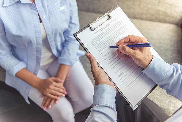 istock Woman at the psychotherapist 610141390