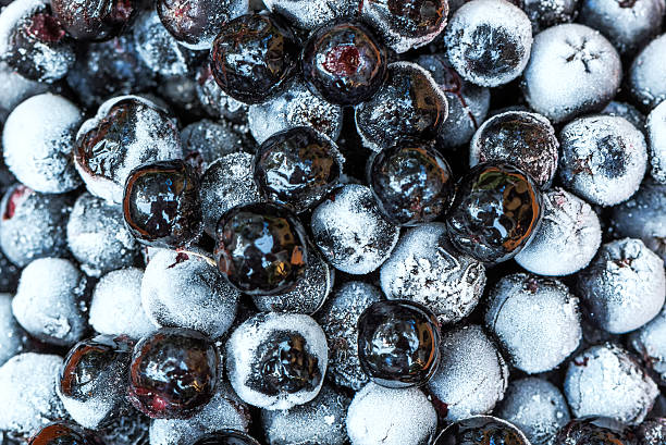 Frozen aronia berries in a bowl