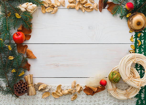 istock Christmas decoration handmade frame on white wood background copy space 610147844