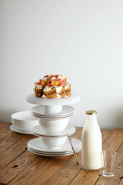 Beautiful dessert presented on a pyramid of teaware