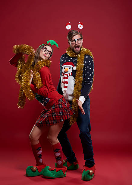 Wild dance of funny couple Wild dance of funny couple nerd sweater stock pictures, royalty-free photos & images