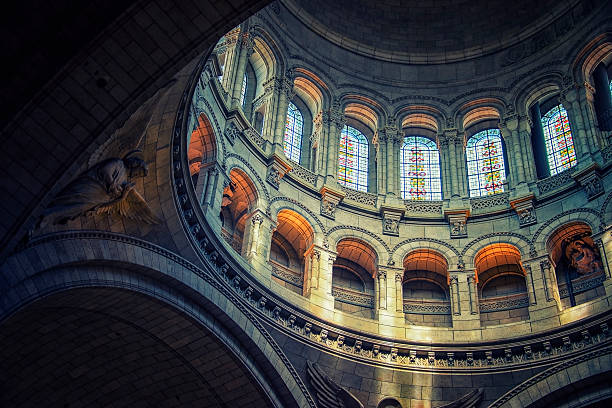 Inside the Sacre-Coeur basilica in Paris Dome of the Sacre-Coeur basilica in Montmartre paris stained glass stock pictures, royalty-free photos & images