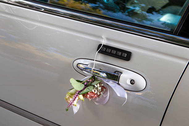 istock Vintage Wedding Car Decorated with Flowers 610154778