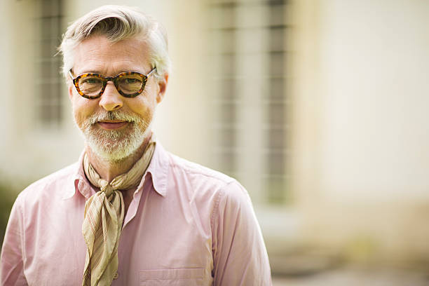 istock High class mature man portrait at home. 610155682