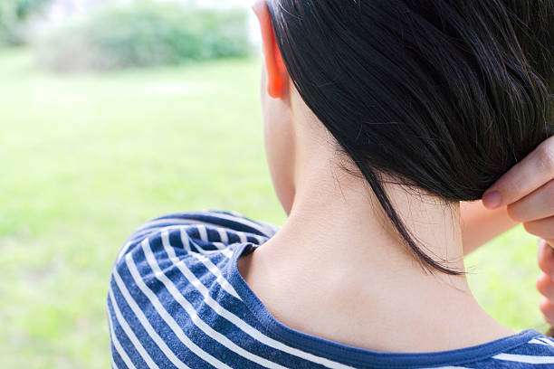 istock Woman combing her hair 610157208