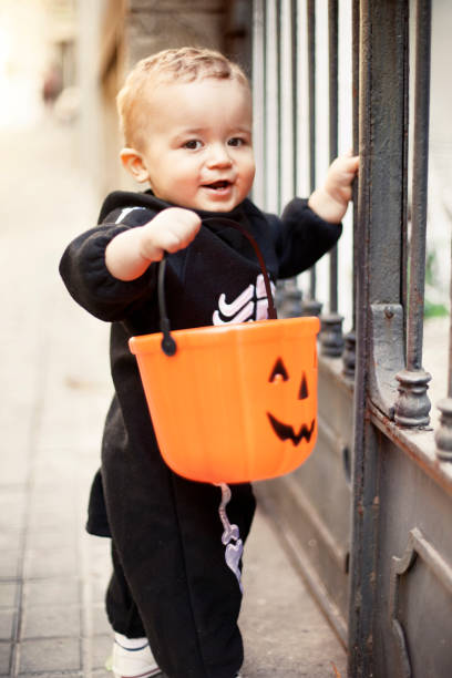 istock Toddler in skeleton costume 610159822