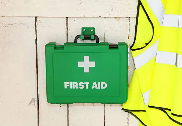 hanging first aid kit and high visability vest