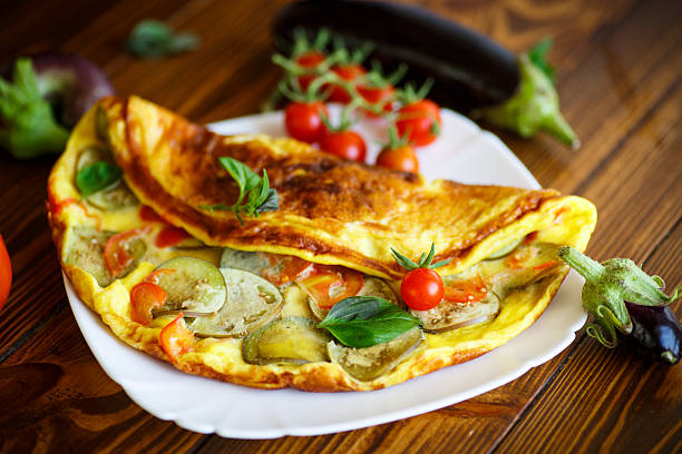 istock fried omelet with eggplant and tomatoes 610217532