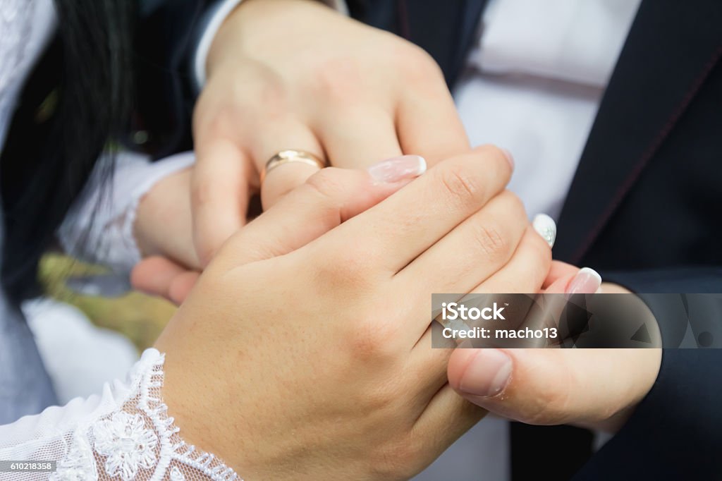 Wedding Rings In The Hands Of Men And Women Stock Photo - Download Image  Now - Adult, Affectionate, Bride - iStock