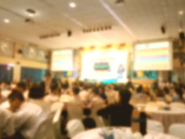 istock blurred group of people in press conference event/people in even 610218594