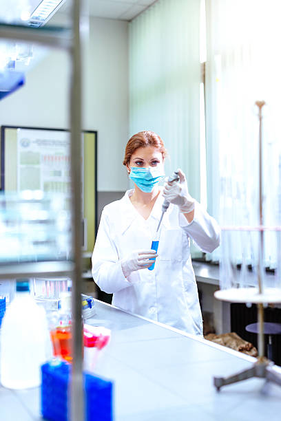 istock Female scientist in laboratory 610219826