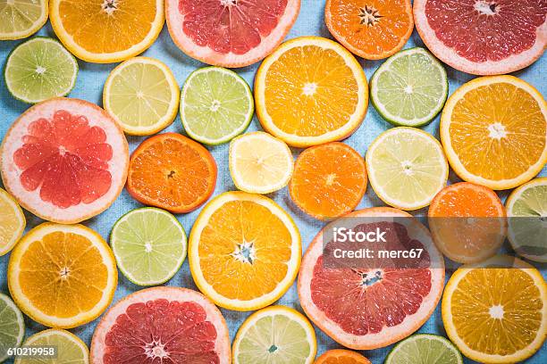 Exotic Citrus Slices Overhead Background Stock Photo - Download Image Now - Above, Backgrounds, Border - Frame