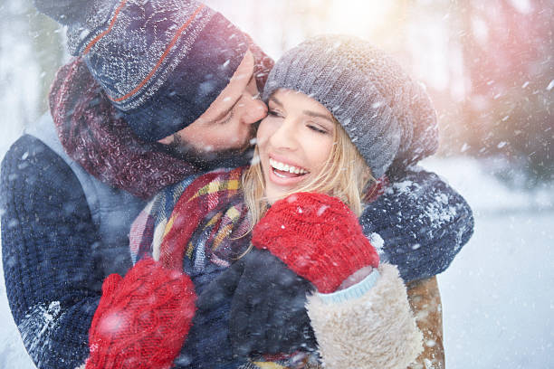 liebe liegt in der luft - couple winter expressing positivity loving stock-fotos und bilder