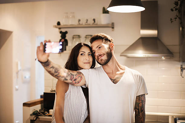 istock Young couple at new home - Selfie 610221662