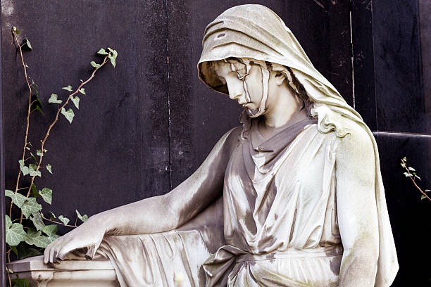 istock weathered sculpture of a sad woman 610223636