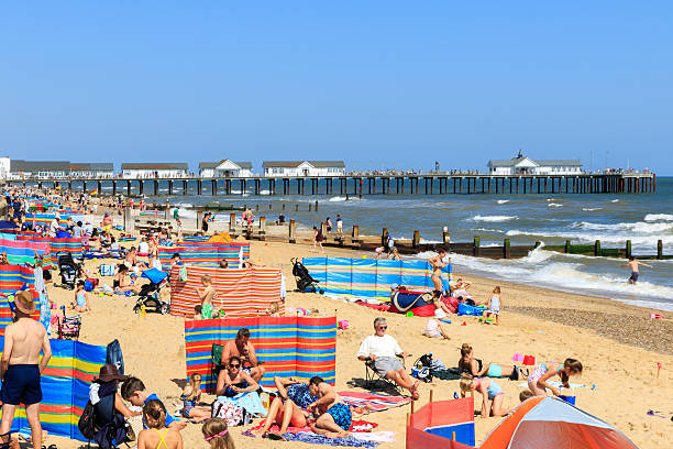 Schleswig-Holstein, Timmendorfer Strand – June 22, 2025: Crowded beach scene at the Baltic Sea on a hot summer day. People enjoying sunbathing, swimming and relaxing at the popular holiday destination in northern Germany
