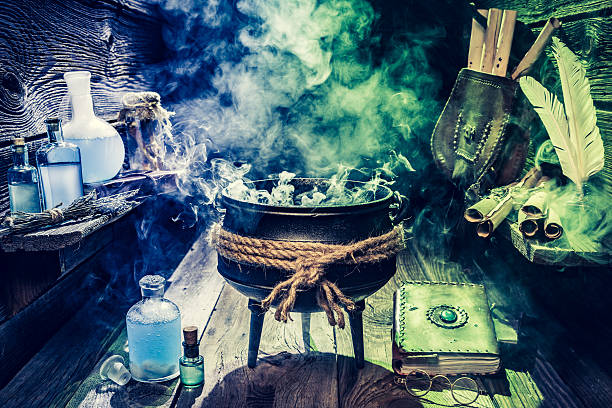 istock Full of magic mixture witch pot with blue potions 610226576