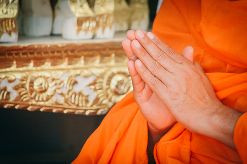 Closeup Hand Pray of Thai Monk.