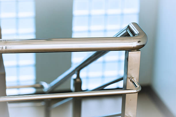 Closeup chrome stainless steel Ladder or Stair Railing Closeup chrome stainless steel Ladder or Stair Railing railings stock pictures, royalty-free photos & images