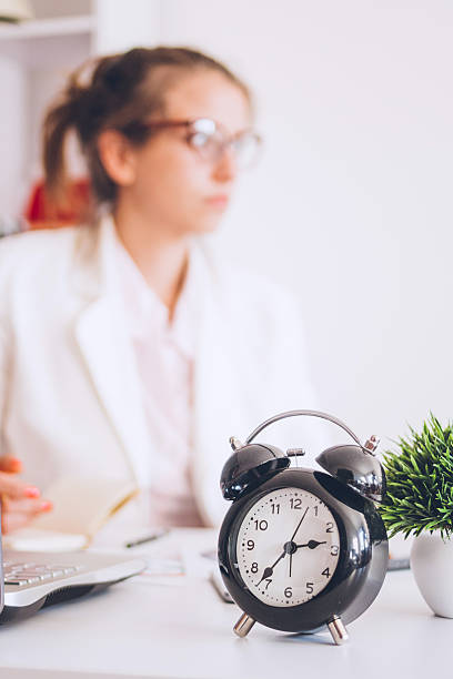 istock Alarm clock on office desk. Concept time to work 610230774