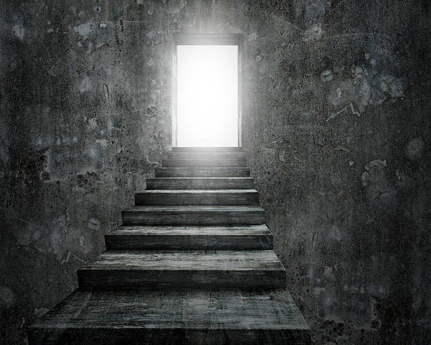 istock Open door with bright light and old dirty concrete stairs 610231068