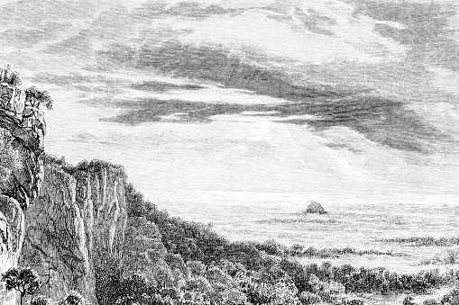 A hand drawn illustration of a coastal landscape from an old 1885 book \