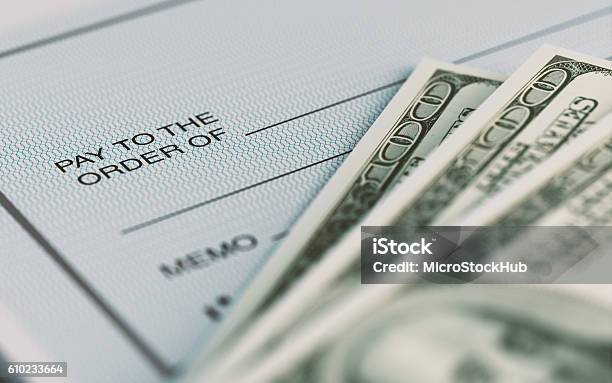 Personal Check And American Dollars With Selective Focus Stock Photo - Download Image Now
