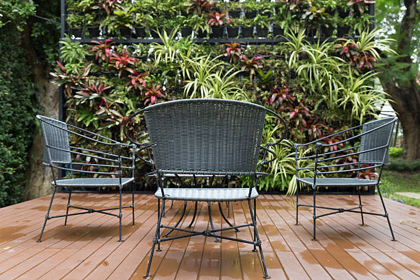 istock rattan wicker chair and desk on patio 610234322