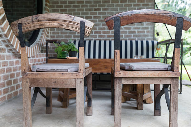 istock wood chair and table on patio 610234768