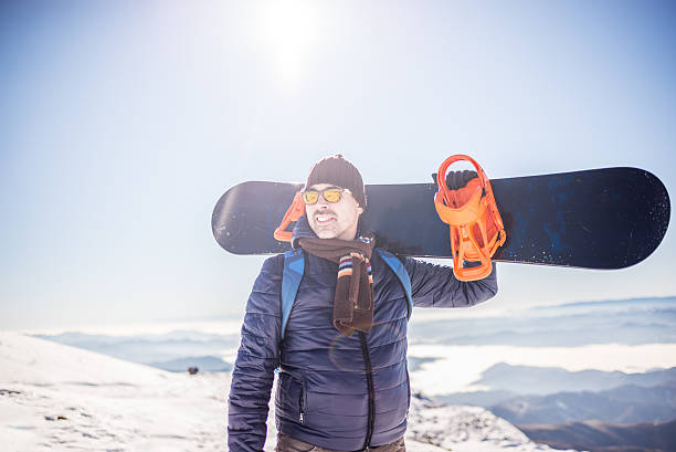 istock Snowboarder at the top of mountain 610237626