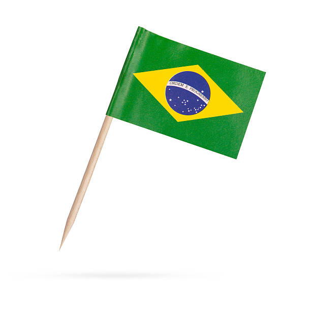 Miniature Flag Brasil. Isolated on white background Miniature paper flag Brasil. Isolated Brasilien flag pointer on white background. With shadow below cocktail stick stock pictures, royalty-free photos & images