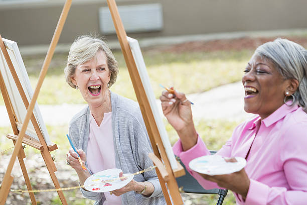 istock Multi-ethnic senior women taking an art class 610240280