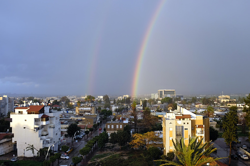Double rainbow after storm over Lod city in Israel.