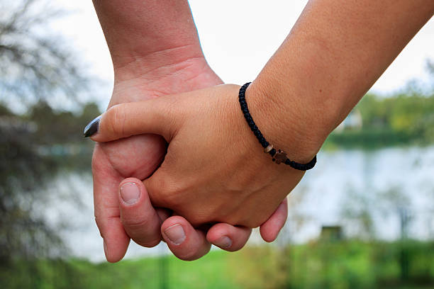 istock Couple in love hand in hand 610240976
