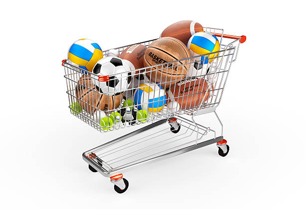 istock Shopping trolley full of balls. 610241640