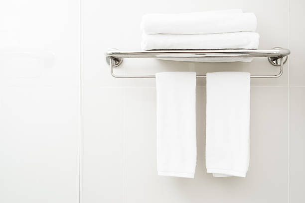 istock white towel in toilet 610242276