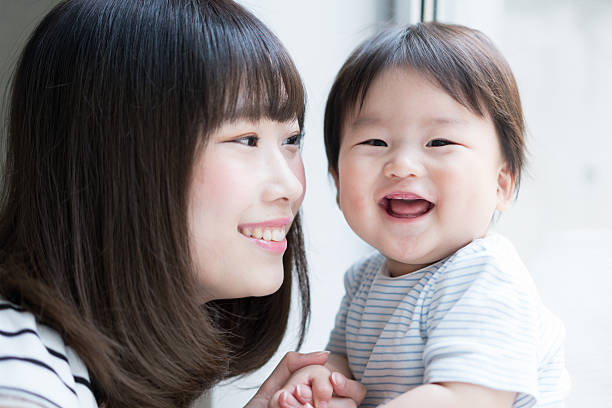 istock Mother and her baby 610242562