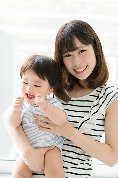 istock Mother and her baby 610243038
