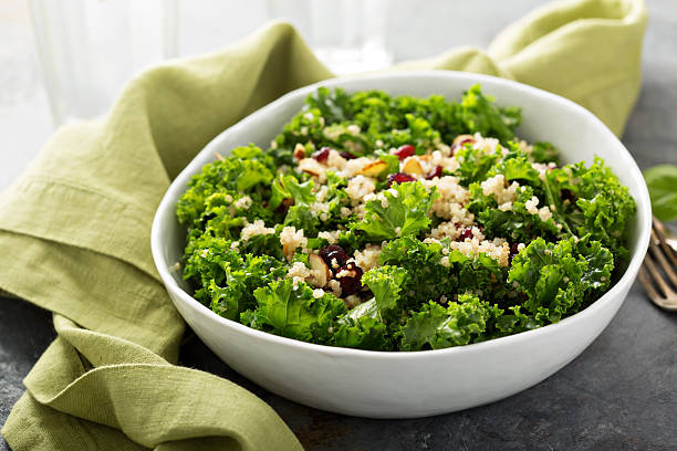 istock Fresh healthy salad with kale and quinoa 610243496
