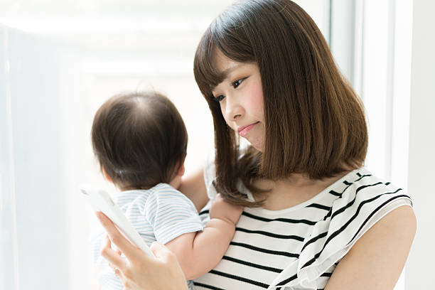 Mother and her baby stock photo