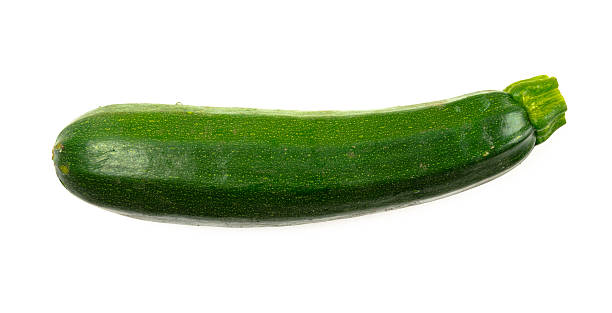 Delicious fresh green zucchini on white background stock photo