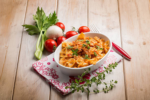 istock pasta with fish ragout and fresh oregano 610246300