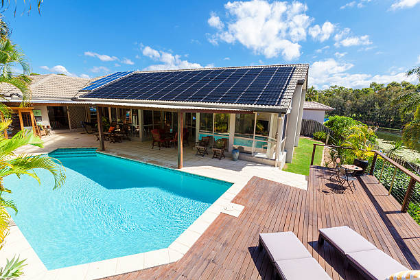 Backyard with swimming pool Backyard with swimming pool in stylish home solar power station stock pictures, royalty-free photos & images