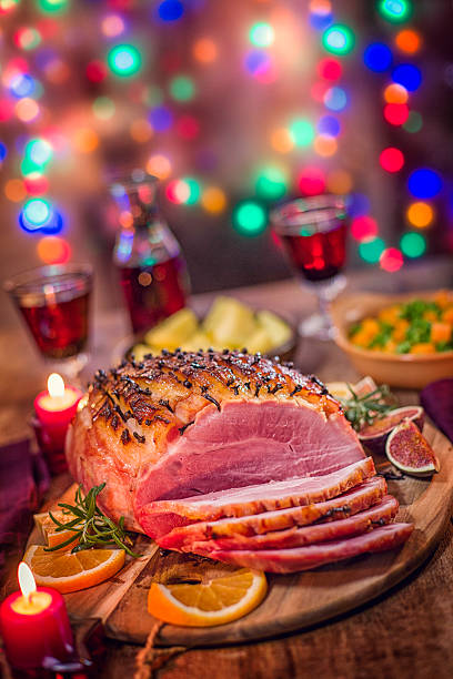 istock Glazed Holiday Ham with Cloves Served for Dinner 610252512