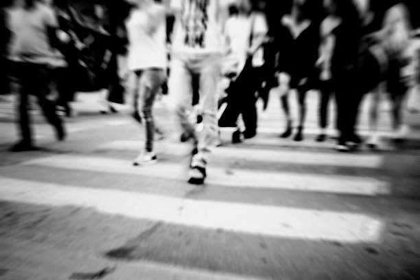 istock people on zebra crossing street 610253414